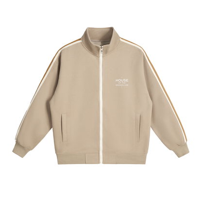 Beige jacket with white stripes on sleeves and 'HOUSE' branding on a white background