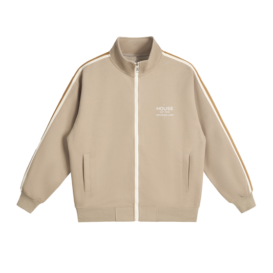 Beige jacket with white stripes on sleeves and 'HOUSE' branding on a white background