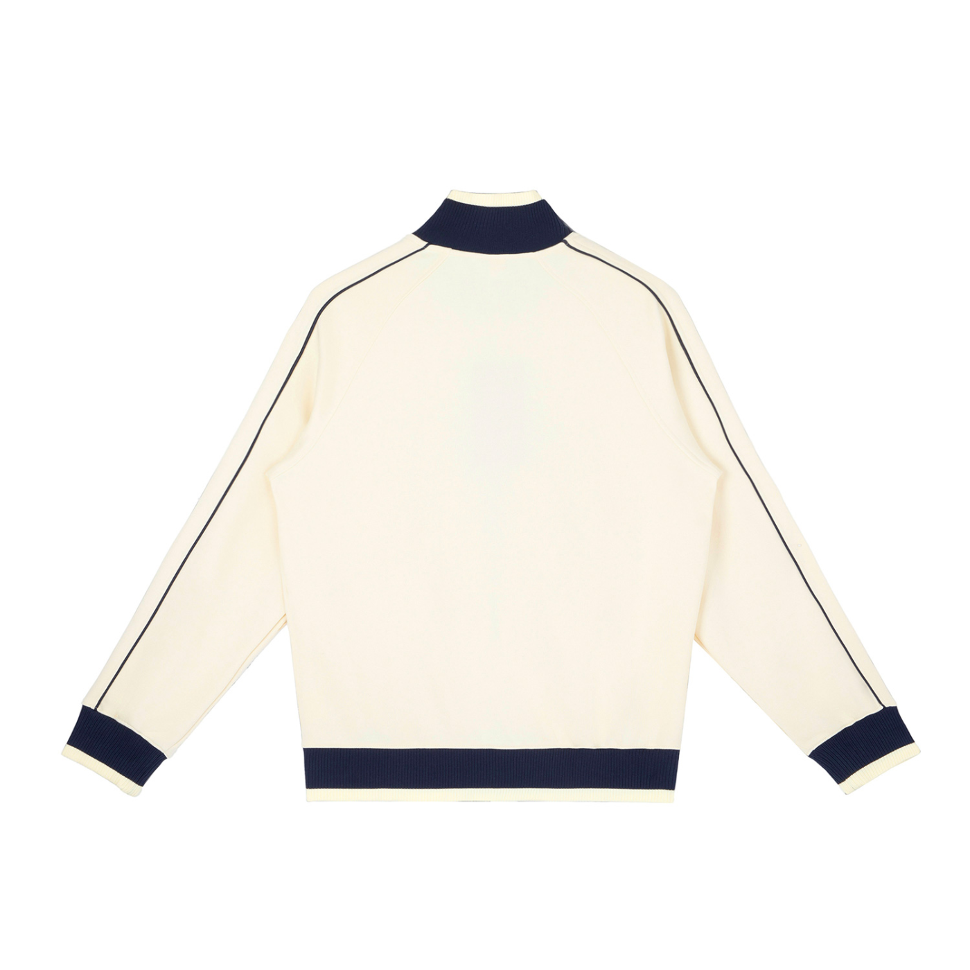 Cream-colored sweater with navy accents on a white background